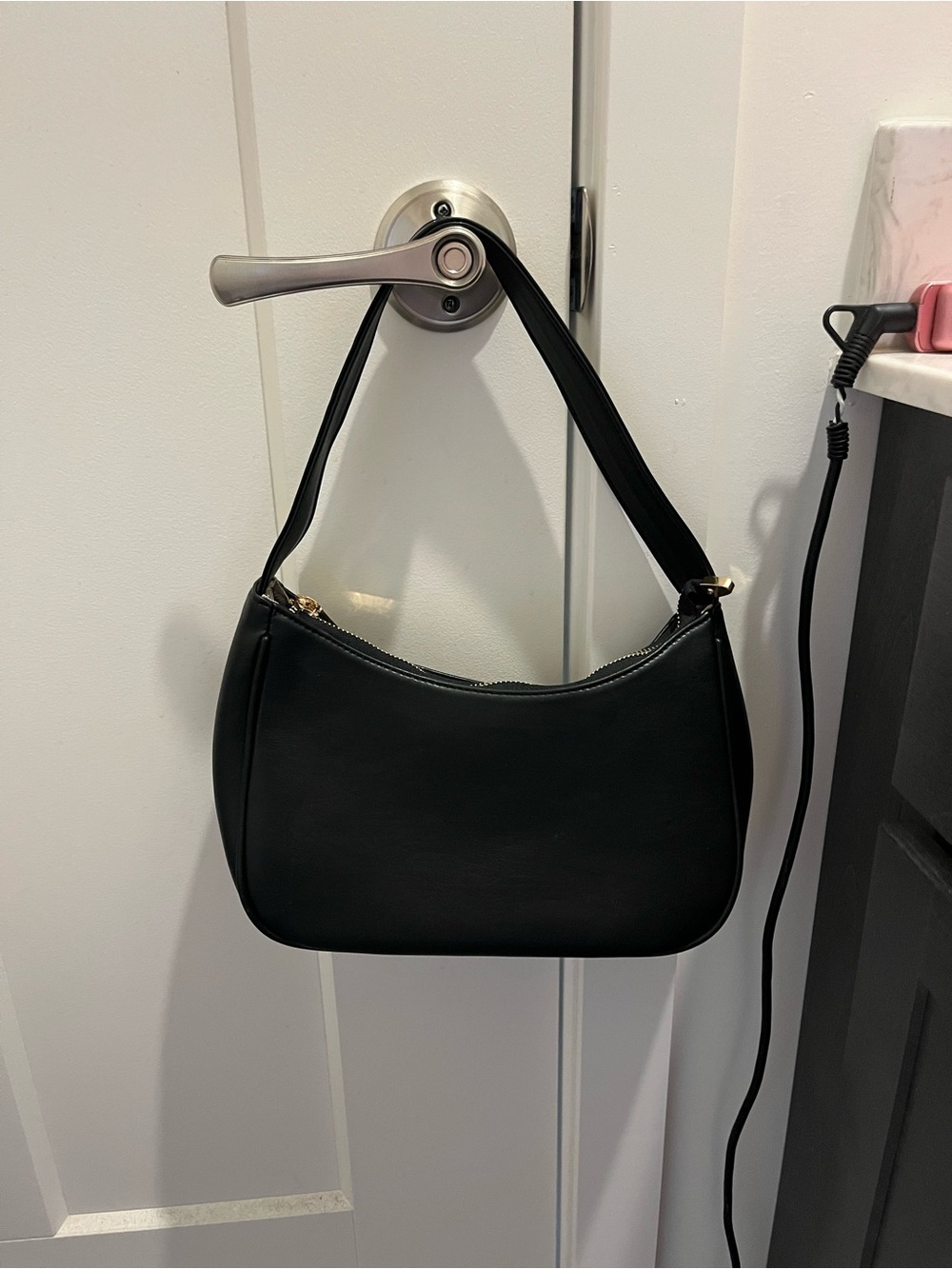 Black faux leather shoulder bag